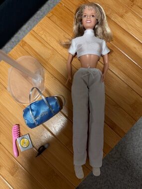 1999 Britney Spears Baby One More Time Doll with accessories and stand